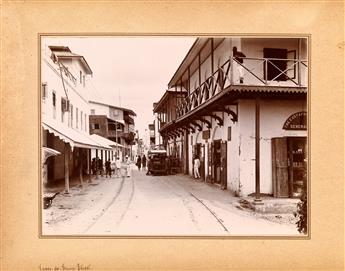(MOMBASA, KENYA) Album with 24 rare and accomplished photographs by Wm. D. Young chronicling the impact of British colonialism on the i